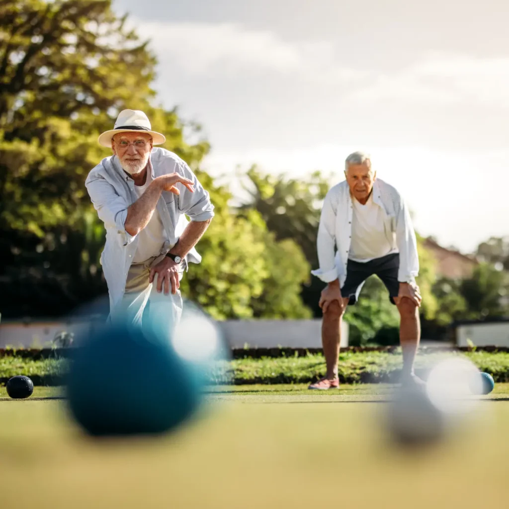 senior men playing bocce ball