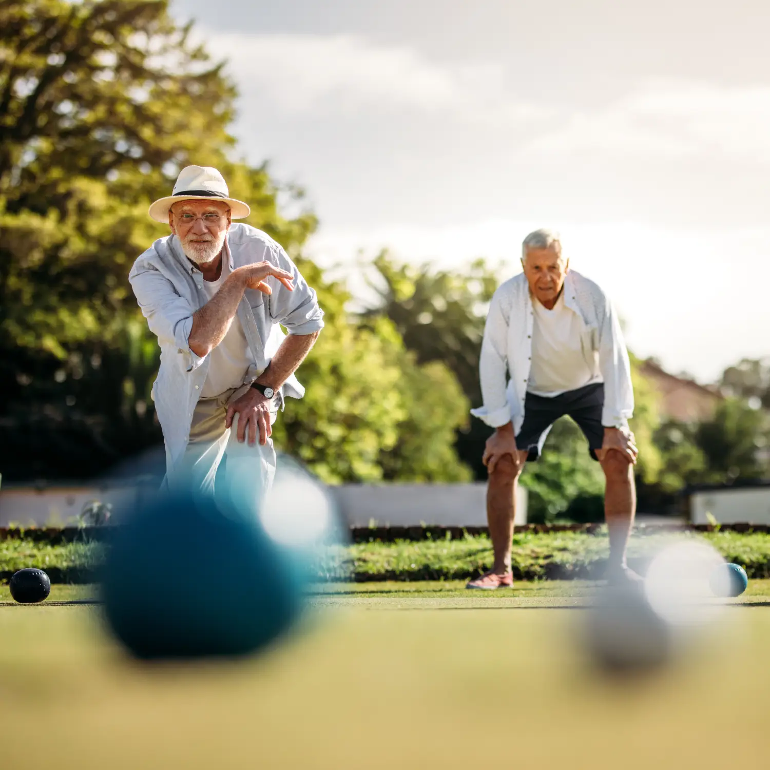 senior men playing bocce ball