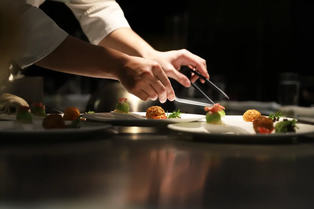 chef plating luxury meal 